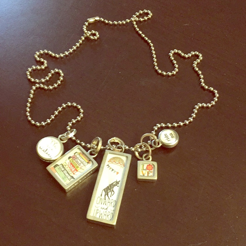 Vintage Look for this Long Dangle Charm Necklace